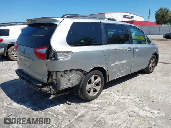 2016 Toyota Sienna LE AAS with VIN 5TDKK3DC8GS728746, listed as a IAAI auction lot 41771751 with 148,774 mi miles. Bid and sale history available at carsss.com. Image 4.