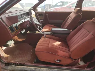 1982 Chevrolet Celebrity z VIN 1G1AW27RXCG123019, wystawiony jako Copart lot #77016544 z przebiegiem 57 150 mil mil oraz Tytuł czysty. Historia ofert i sprzedaży dostępna na DreamBid. Obrazek 7.