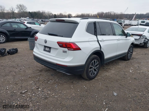 2020 Volkswagen Tiguan SE with VIN 3VV2B7AX0LM075033, listed as a IAAI auction lot 41310056 with 82,548 mi miles. Bid and sale history available at carsss.com. Image 4.