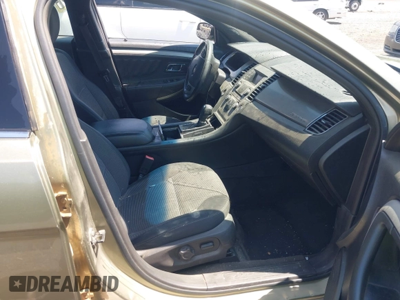 2013 Ford Taurus SEL with VIN 1FAHP2E88DG105557, listed as a IAAI auction lot 42040773 with 157,705 mi miles and . Bid and sale history available at carsss.com. Image 5.