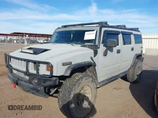 2003 Hummer H2 with VIN 5GRGN23U13H128617, listed as a IAAI auction lot 41494349 with 135,295 mi miles. Bid and sale history available at carsss.com. Image 17.