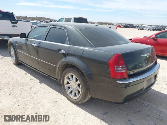 2006 Chrysler 300 C with VIN 2C3KA63H56H316500, listed as a IAAI auction lot 41811247 with 135,100 mi miles. Bid and sale history available at carsss.com. Image 3.