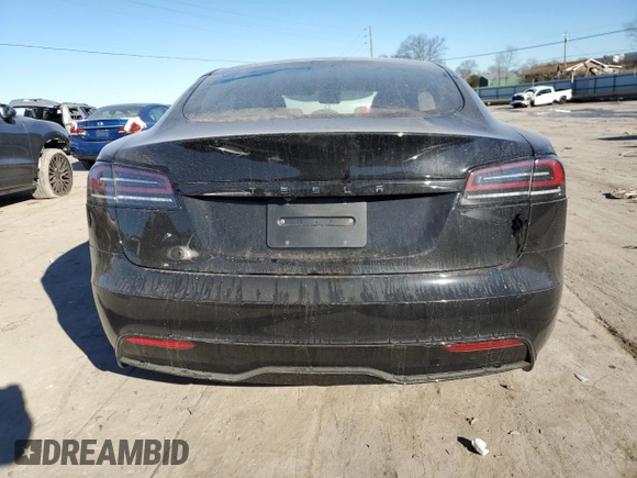 2023 Tesla Model S with VIN 5YJSA1E5XPF519570, listed as a Copart auction lot 80573863 with Not provided miles and Salvage title. Bid and sale history available at DreamBid. Image 6.