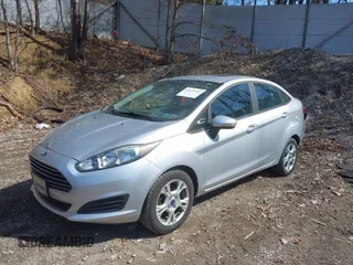 2016 Ford Fiesta SE with VIN 3FADP4BJ4GM106538, listed as a IAAI auction lot 41871345 with 123,847 mi miles. Bid and sale history available at carsss.com. Image 18.
