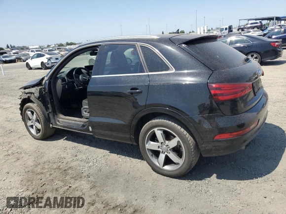 2015 Audi Q3 Premium Plus with VIN WA1EFCFS3FR013984, listed as a Copart auction lot 58785965 with 172,930 mi miles and Salvage title. Bid and sale history available at DreamBid. Image 2.