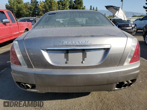 2006 Maserati Quattroporte z VIN ZAMCE39A960026645, wystawiony jako Copart lot #74550174 z przebiegiem 50 591 mil mil oraz Tytuł czysty. Historia ofert i sprzedaży dostępna na DreamBid. Obrazek 6.