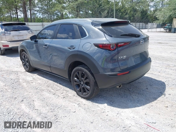 2024 Mazda CX-30 S Preferred with VIN 3MVDMBCM5RM648894, listed as a IAAI auction lot 42119860 with 23,857 mi miles and . Bid and sale history available at DreamBid. Image 3.
