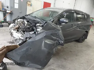 2014 Mazda 5 Sport z VIN JM1CW2BLXE0164748, wystawiony jako IAAI lot #42064606 z przebiegiem 140 169 mil mil oraz . Historia ofert i sprzedaży dostępna na DreamBid. Obrazek 17.