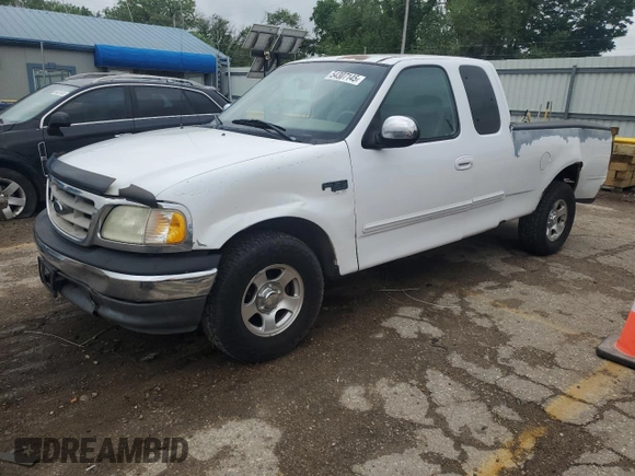 2002 Ford F-150 XL with VIN 1FTRX17L52KC49698, listed as a Copart auction lot 54307145 with 254,394 mi miles and Salvage title. Bid and sale history available at DreamBid. Image 1.