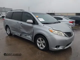 2014 Toyota Sienna LE AAS with VIN 5TDKK3DC9ES501255, listed as a IAAI auction lot 42096386 with 347,364 mi miles. Bid and sale history available at carsss.com. Image 1.