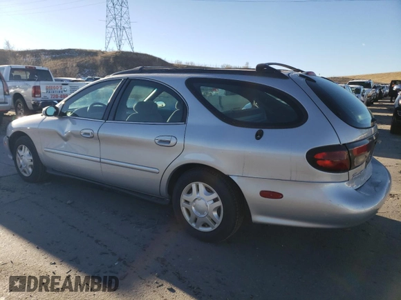 1999 Ford Taurus SE with VIN 1FAFP58U5XG240517, listed as a Copart auction lot 83514044 with 101,092 mi miles and Clean title. Bid and sale history available at DreamBid. Image 2.