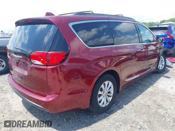 2017 Chrysler Pacifica Touring L with VIN 2C4RC1BG0HR591124, listed as a IAAI auction lot 42138595 with 113,071 mi miles and . Bid and sale history available at DreamBid. Image 4.