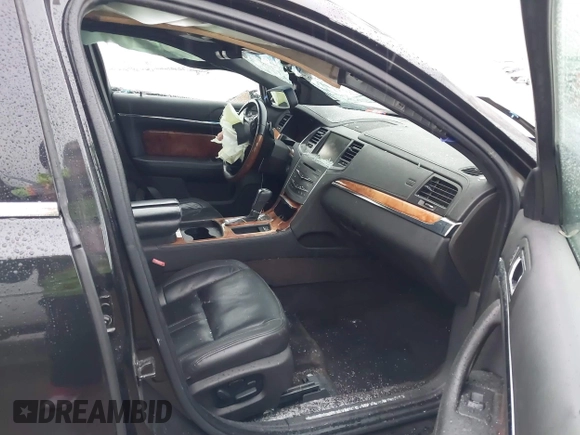 2014 Lincoln MKS with VIN 1LNHL9DK6EG609386, listed as a IAAI auction lot 41195270 with 144,395 mi miles and . Bid and sale history available at DreamBid. Image 5.