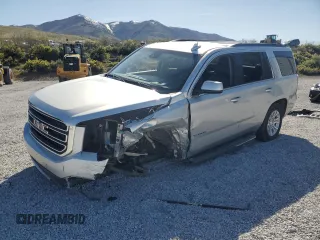 2016 GMC Yukon SLT z VIN 1GKS2BKC2GR146674, wystawiony jako Copart lot #55167375 z przebiegiem Nie podano mil oraz Szkoda całkowita • Salvage title. Historia ofert i sprzedaży dostępna na DreamBid. Obrazek 1.