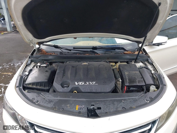 2014 Chevrolet Impala LTZ with VIN 1G1155S38EU105260, listed as a IAAI auction lot 42012082 with 230,407 mi miles. Bid and sale history available at carsss.com. Image 10.
