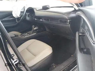 2023 Mazda CX-30 S Carbon Edition with VIN 3MVDMBCMXPM520776, listed as a IAAI auction lot 42205047 with Not provided miles and . Bid and sale history available at DreamBid. Image 5.