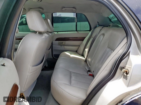2004 Mercury Grand Marquis GS z VIN 2MEFM74W64X603871, wystawiony jako Copart lot #56545655 z przebiegiem 206 427 mil mil oraz Szkoda całkowita • Salvage title. Historia ofert i sprzedaży dostępna na DreamBid. Obrazek 10.
