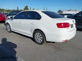 2013 Volkswagen Jetta Sedan S with VIN 3VW2K7AJ6DM292059, listed as a IAAI auction lot 41707783 with 127,254 mi miles. Bid and sale history available at carsss.com. Image 3.