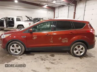 2015 Ford Escape SE with VIN 1FMCU0GX3FUB12115, listed as a IAAI auction lot 41282103 with 191,231 mi miles and . Bid and sale history available at DreamBid. Image 14.