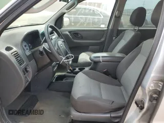 2004 Ford Escape XLS с VIN 1FMYU02134KA88982, выставлен на аукционе Copart как лот 57037915 с пробегом 195 423 миль миль и Списание • Salvage title. История ставок и продаж доступна на DreamBid. Изображение 7.
