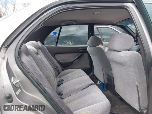 1994 Toyota Camry LE z VIN 4T1SK12E0RU463582, wystawiony jako IAAI lot #41823733 z przebiegiem 120 050 mil mil oraz . Historia ofert i sprzedaży dostępna na DreamBid. Obrazek 8.