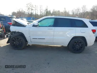 2017 Jeep Grand Cherokee Laredo with VIN 1C4RJFAG9HC910422, listed as a IAAI auction lot 41185537 with 84,784 mi miles. Bid and sale history available at carsss.com. Image 14.