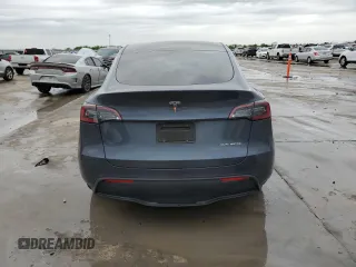 2023 Tesla Model Y Long Range with VIN 7SAYGDEE3PA151887, listed as a Copart auction lot 51459495 with 15,562 mi miles and Salvage Title. Bid and sale history available at DreamBid. Image 6.