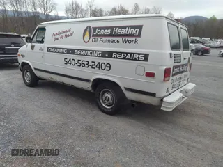 1995 Chevrolet Chevy Van z VIN 1GCEG25K2SF159884, wystawiony jako IAAI lot #41947206 z przebiegiem 308 693 mil mil oraz . Historia ofert i sprzedaży dostępna na DreamBid. Obrazek 3.