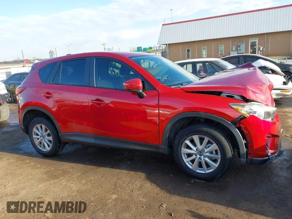 2015 Mazda CX-5 Sport z VIN JM3KE2BE7F0516869, wystawiony jako IAAI lot #41866488 z przebiegiem 131 237 mil mil oraz . Historia ofert i sprzedaży dostępna na DreamBid. Obrazek 13.