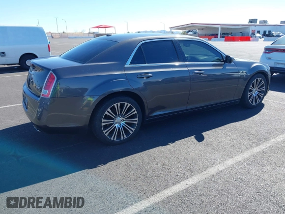 2013 Chrysler 300 with VIN 2C3CCABT4DH644186, listed as a IAAI auction lot 41693442 with 102,802 mi miles. Bid and sale history available at carsss.com. Image 4.