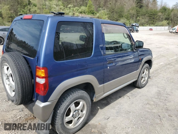1999 Mitsubishi Montero z VIN H58A0013724, wystawiony jako Copart lot #52986435 z przebiegiem 88 711 mil mil oraz Szkoda całkowita • Salvage title. Historia ofert i sprzedaży dostępna na DreamBid. Obrazek 2.
