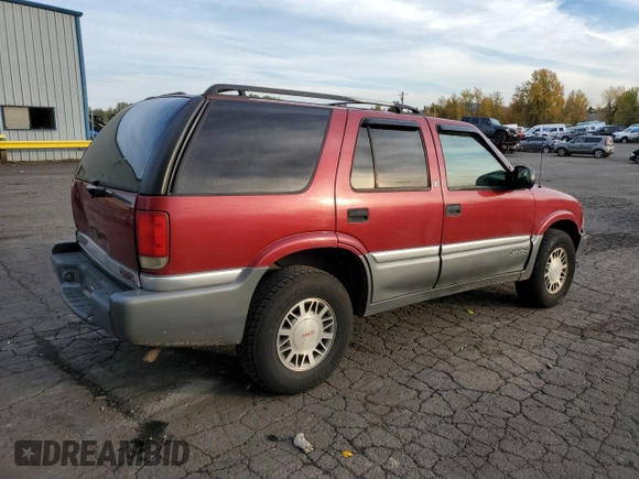 1999 GMC Jimmy SLE with VIN 1GKDT13W6X2508118, listed as a Copart auction lot 79761444 with 195,738 mi miles and Salvage Title. Bid and sale history available at carsss.com. Image 3.
