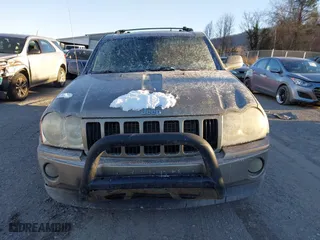 2005 Jeep Grand Cherokee Laredo with VIN 1J4HR48N55C561732, listed as a IAAI auction lot 41349373 with 185,920 mi miles. Bid and sale history available at carsss.com. Image 13.