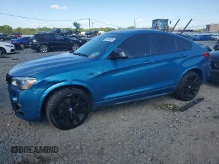 2017 BMW X4 M40i with VIN 5UXXW7C58H0U25599, listed as a Copart auction lot 61489334 with 115,001 mi miles and Salvage Title. Bid and sale history available at carsss.com. Image 1.