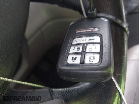 2015 Honda Odyssey Touring Elite with VIN 5FNRL5H96FB045968, listed as a IAAI auction lot 42263637 with 207,637 mi miles and . Bid and sale history available at DreamBid. Image 11.
