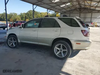 1999 Lexus RX 300 Luxury SUV with VIN JT6GF10U6X0043264, listed as a Copart auction lot 77552034 with 207,941 mi miles and Salvage Title. Bid and sale history available at carsss.com. Image 2.
