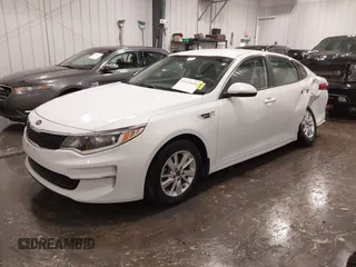 2016 Kia Optima LX with VIN 5XXGT4L38GG048180, listed as a IAAI auction lot 41923650 with 58,018 mi miles. Bid and sale history available at carsss.com. Image 2.