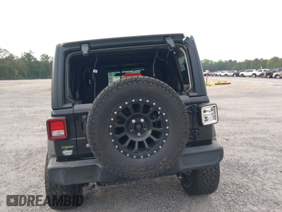 2021 Jeep Wrangler Unlimited Willys z VIN 1C4HJXDM5MW859724, wystawiony jako IAAI lot #42311203 z przebiegiem 71 887 mil mil oraz . Historia ofert i sprzedaży dostępna na DreamBid. Obrazek 16.