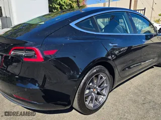 2018 Tesla Model 3 Long Range Battery with VIN 5YJ3E1EA0JF173302, listed as a Copart auction lot 54197265 with 59,956 mi miles and Salvage Title. Bid and sale history available at carsss.com. Image 4.
