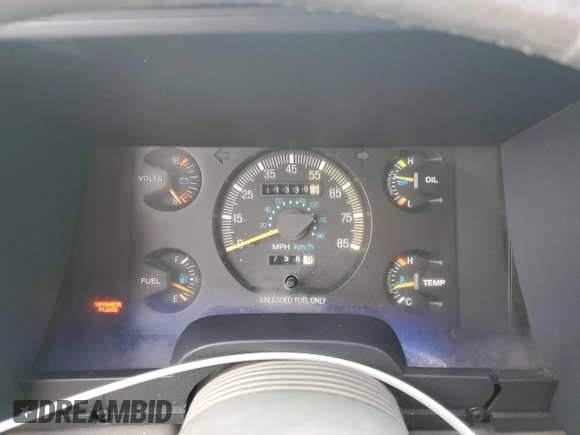 1990 Ford Aerostar z VIN 1FMDA31X6LZB41923, wystawiony jako Copart lot #86900154 z przebiegiem 11 339 mil mil oraz Szkoda całkowita • Salvage title. Historia ofert i sprzedaży dostępna na DreamBid. Obrazek 9.