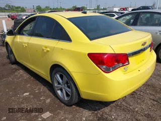 2014 Chevrolet Cruze 2LT z VIN 1G1PE5SB8E7405073, wystawiony jako IAAI lot #42434410 z przebiegiem 147 840 mil mil oraz . Historia ofert i sprzedaży dostępna na DreamBid. Obrazek 3.
