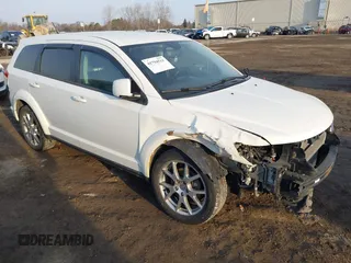 2014 Dodge Journey R/T z VIN 3C4PDDEG0ET309476, wystawiony jako IAAI lot #41794511 z przebiegiem 125 313 mil mil oraz . Historia ofert i sprzedaży dostępna na DreamBid. Obrazek 1.