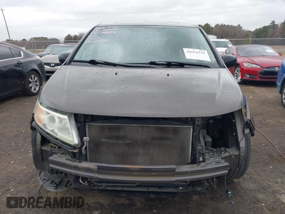 2012 Honda Odyssey Touring with VIN 5FNRL5H99CB071010, listed as a IAAI auction lot 41651233 with 186,913 mi miles. Bid and sale history available at carsss.com. Image 13.