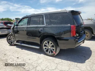 2015 Chevrolet Tahoe LTZ z VIN 1GNSKCKC8FR506151, wystawiony jako Copart lot #59948174 z przebiegiem Nie podano mil oraz Szkoda całkowita • Salvage title. Historia ofert i sprzedaży dostępna na DreamBid. Obrazek 2.