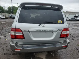 2006 Toyota Land Cruiser z VIN JTEHT05J262087016, wystawiony jako Copart lot #56294635 z przebiegiem 221 315 mil mil oraz Tytuł czysty. Historia ofert i sprzedaży dostępna na DreamBid. Obrazek 6.