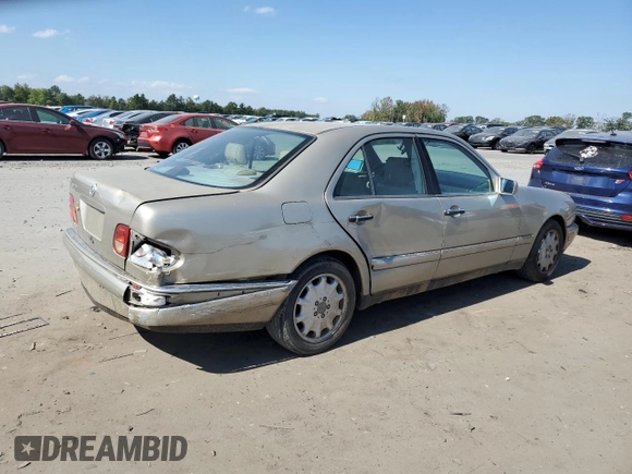 1997 Mercedes-Benz E-Class with VIN WDBJF55F8VJ031008, listed as a Copart auction lot 74305684 with 308,905 mi miles and Clean Title. Bid and sale history available at carsss.com. Image 3.