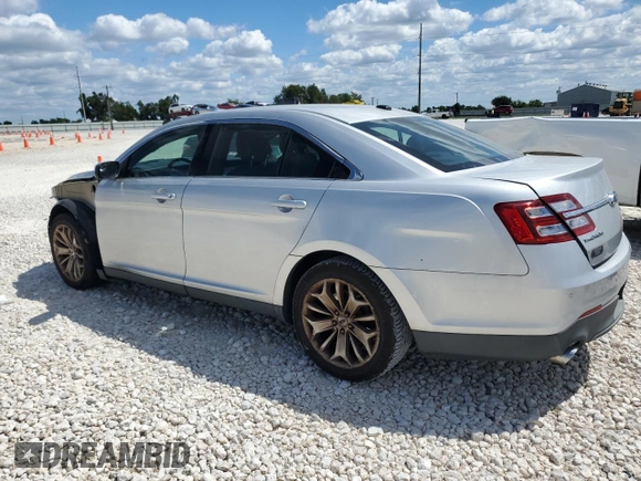 2013 Ford Taurus Limited z VIN 1FAHP2F80DG105499, wystawiony jako Copart lot #70792614 z przebiegiem 106 425 mil mil oraz Czysty tytuł • Clean title. Historia ofert i sprzedaży dostępna na DreamBid. Obrazek 2.