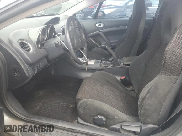 2008 Mitsubishi Eclipse GS with VIN 4A3AK24F88E040573, listed as a Copart auction lot 52558584 with 166,424 mi miles and Salvage Title. Bid and sale history available at DreamBid. Image 7.
