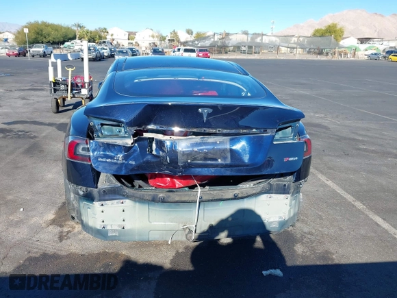 2014 Tesla Model S 60 with VIN 5YJSA1H14EFP57209, listed as a IAAI auction lot 41305157 with 141,364 mi miles and . Bid and sale history available at DreamBid. Image 6.