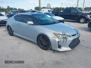 2014 Scion tC z VIN JTKJF5C77E3075947, wystawiony jako IAAI lot #41982566 z przebiegiem 121 639 mil mil oraz . Historia ofert i sprzedaży dostępna na DreamBid. Obrazek 1.